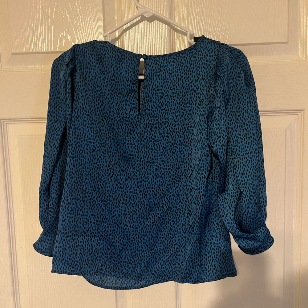 Women’s Banana Republic top. Blue with black leopard spots XS petite. NWT.